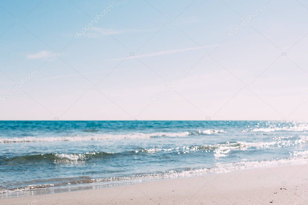Summer sand beach and seashore waves background