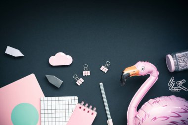 Pink colored objects on black background, top view clipart