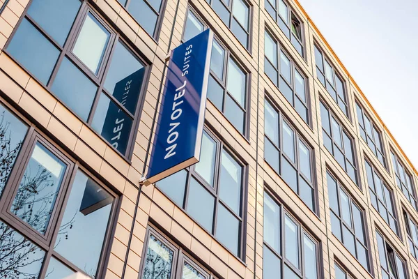 Novotel suites logo at hotel building in Munich — Stock Photo, Image