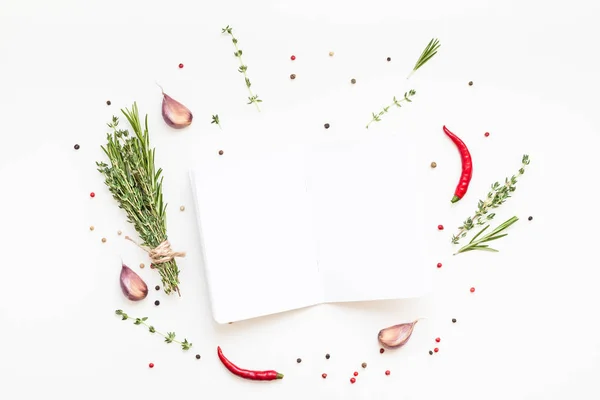 Blank notepad pages with greens herbs and spices — Stock Photo, Image