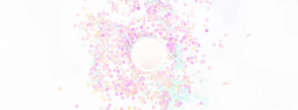 Cosmetic cream jar on pearl pastel confetti — Stock Photo, Image