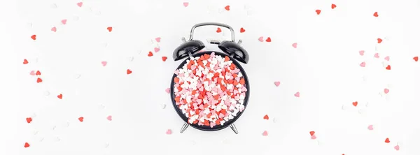 Valentine Day concept with alarm clock and hearts — Stock Photo, Image
