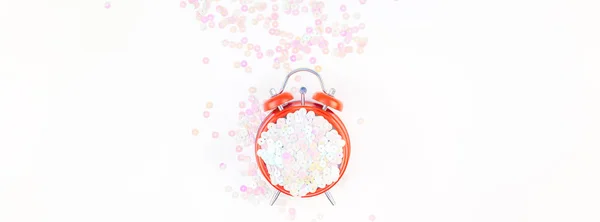 Perla pastel confeti destellos y despertador rojo — Foto de Stock