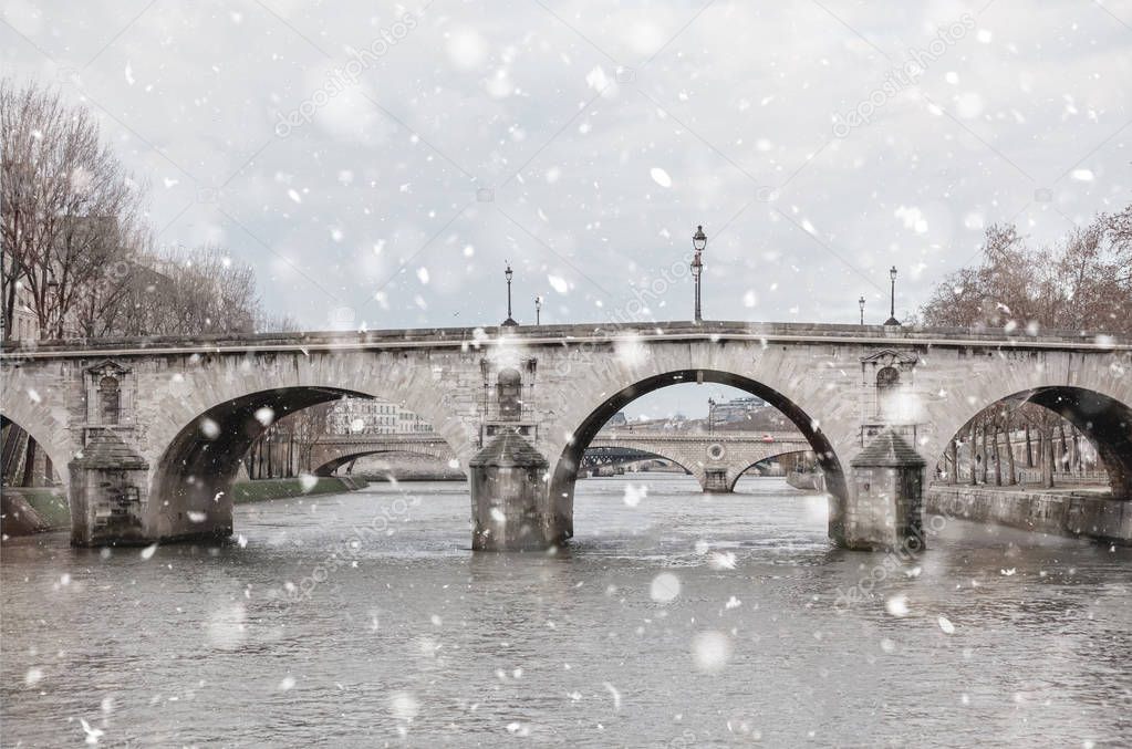 Seine River, bridges, Paris in gloomy winter day