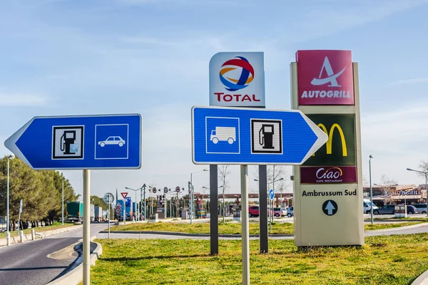 Road signs at Total gas service station — Stock Photo, Image