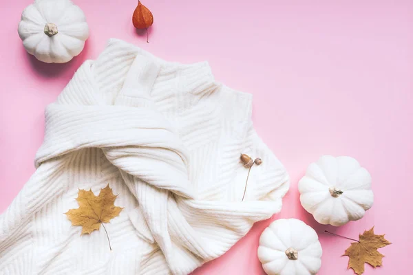 Fall composition with white sweater and pumpkins — Stock Photo, Image
