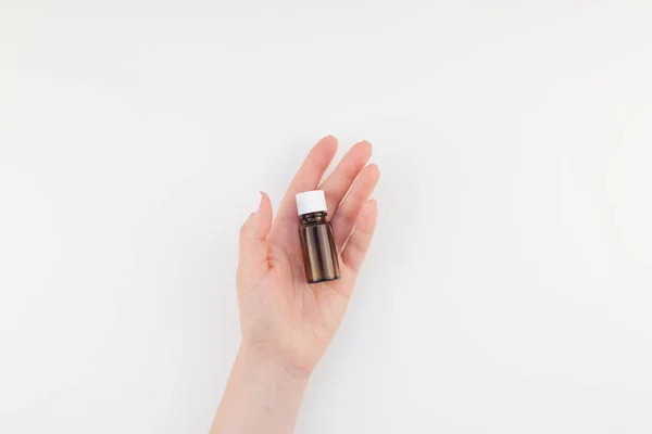 Download Woman Hand With Pastel Manicure Polish Holding Small Glass Bottle Isolated White Background With Copy Space Mock Up For Natural Oil Spa Treatment Medical Products Female Healthcare Wellness Concept Adult Showing