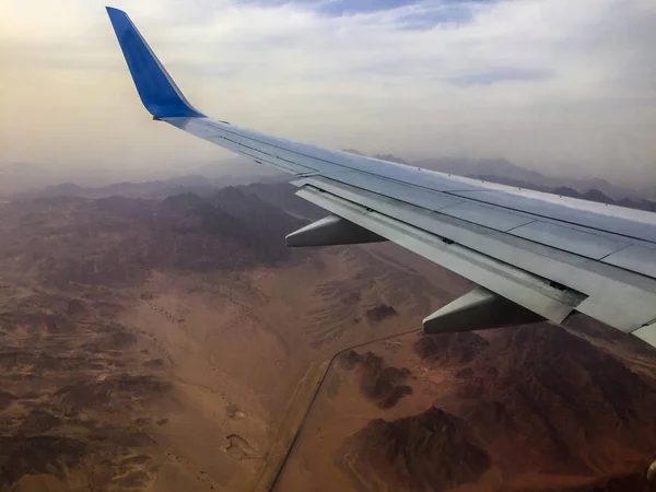 Airplane above the desert Sinay , preparing to  -  land at Sharm el Sheih airport