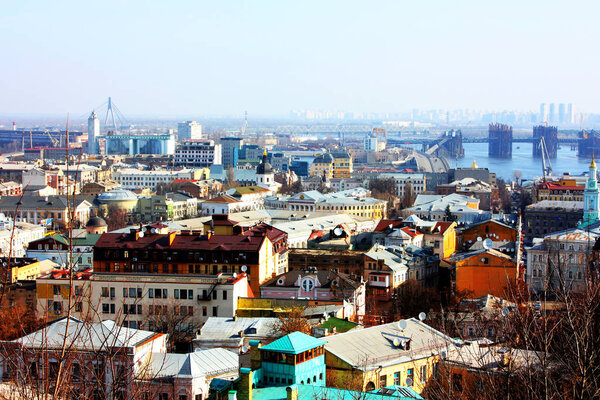 Kiev bussines and industry city landscape on river, bringe, and buildings taken in spring 