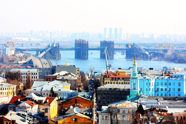 Kiev bussines and industry city landscape on river, bringe, and buildings taken in spring 