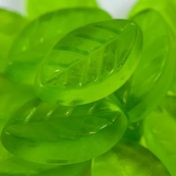 Grüne Blatt Form Gelee Bonbons Hintergrund — Stockfoto