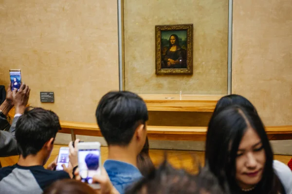 stock image PARIS, FRANCE - October 11, 2016: Visitors take photo of Leonard