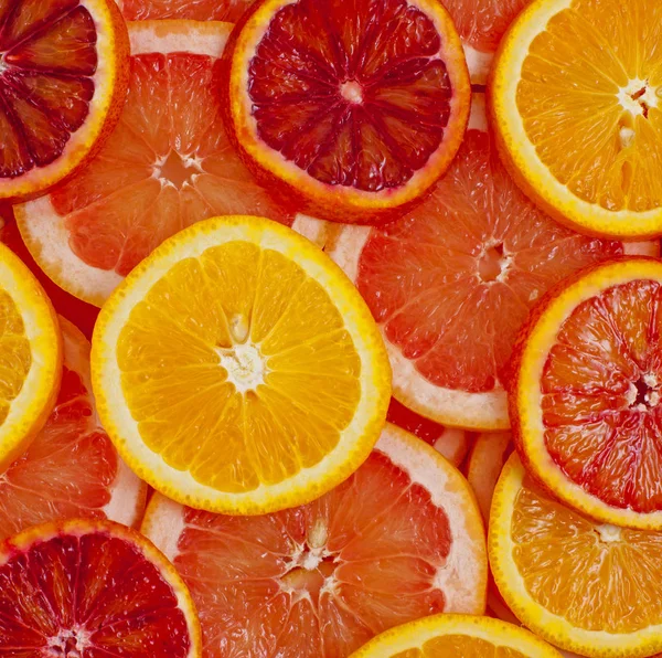 Různé Druhy Pomerančů Grapefruitové Plátky Pozadí — Stock fotografie