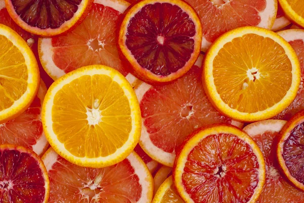 Různé Druhy Pomerančů Grapefruitové Plátky Pozadí — Stock fotografie