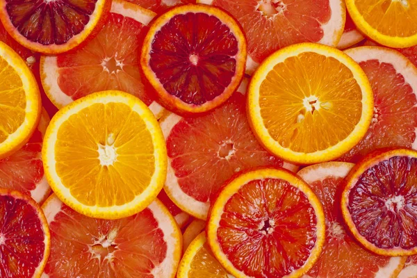 Různé Druhy Pomerančů Grapefruitové Plátky Pozadí — Stock fotografie