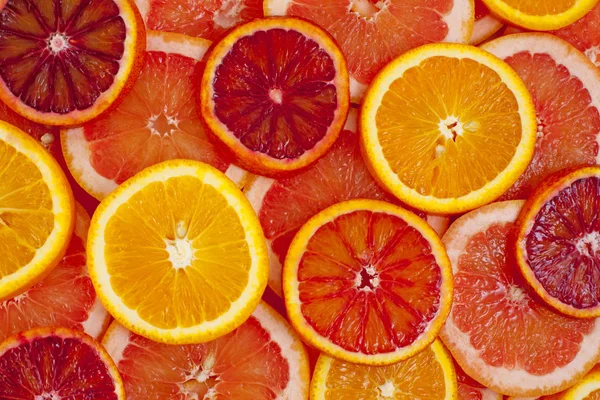 Různé Druhy Pomerančů Grapefruitové Plátky Pozadí — Stock fotografie