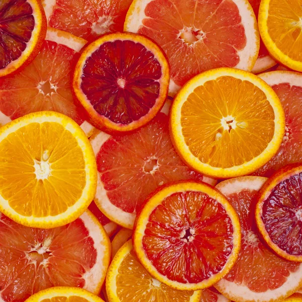 Různé Druhy Pomerančů Grapefruitové Plátky Pozadí — Stock fotografie