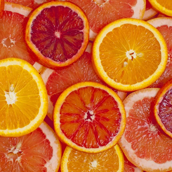 Různé Druhy Pomerančů Grapefruitové Plátky Pozadí — Stock fotografie