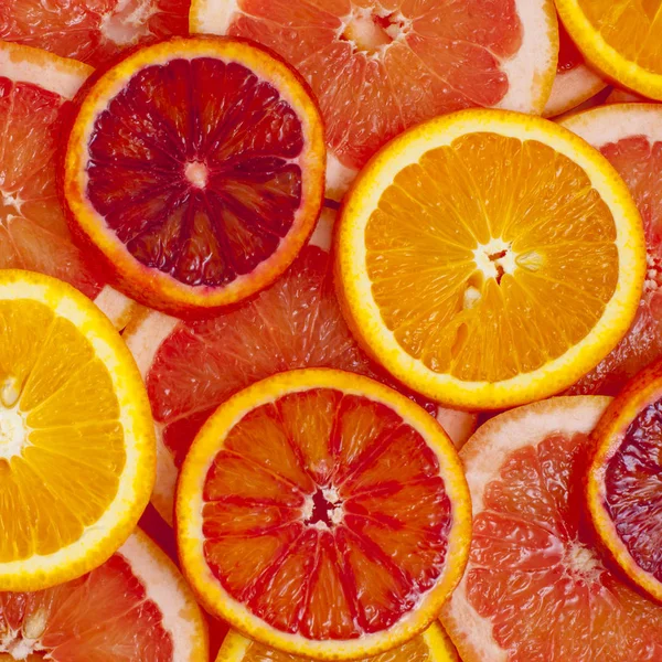 Různé Druhy Pomerančů Grapefruitové Plátky Pozadí — Stock fotografie