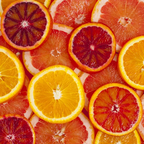 Různé Druhy Pomerančů Grapefruitové Plátky Pozadí — Stock fotografie