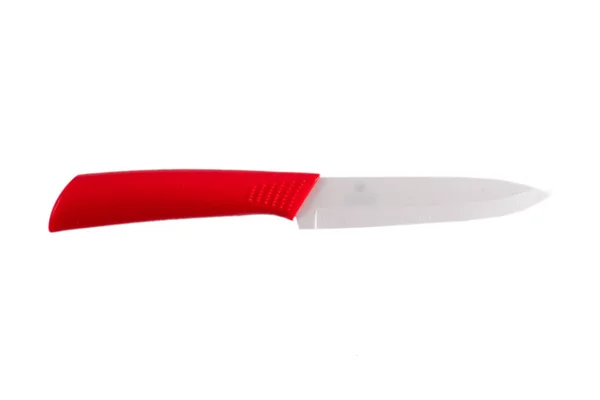 Beyaz arka plan üzerinde izole kırmızı seramik bıçak — Stok fotoğraf