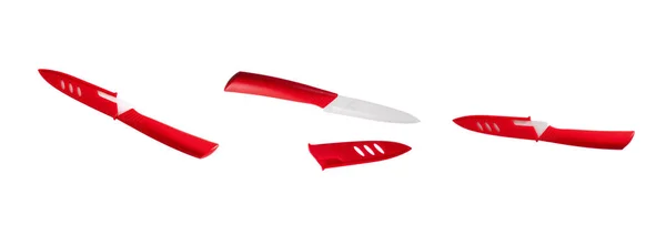 Red ceramic knife isolated on the white background — Stock Photo, Image