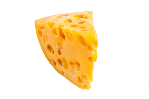 En bit gul Gouda ost isolerad på vit bakgrund — Stockfoto