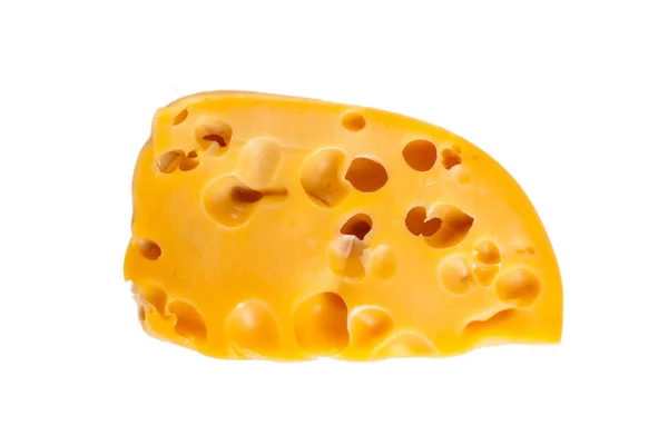 Een stukje gele Goudse kaas geïsoleerd op witte achtergrond — Stockfoto