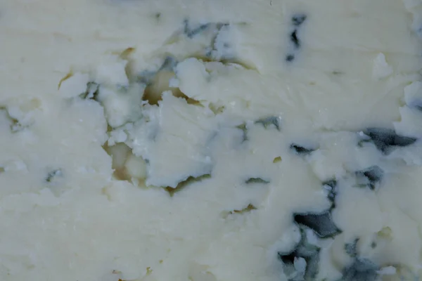 Zár-megjelöl-ból kék sajt. sajt háttér — Stock Fotó