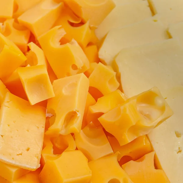 Sortimento de diferentes tipos de queijo holandês, fundo — Fotografia de Stock
