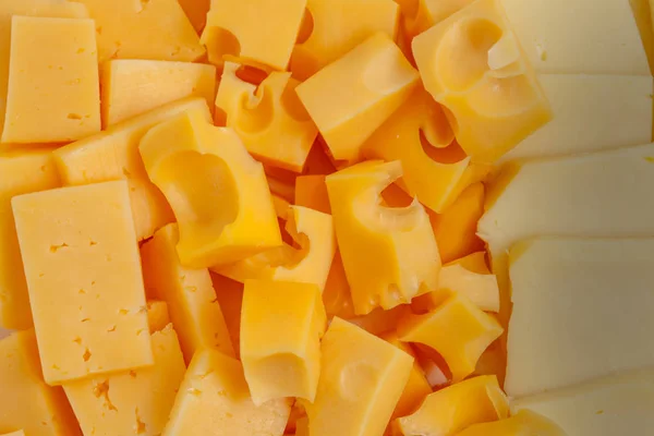 Sortimento de diferentes tipos de queijo holandês, fundo — Fotografia de Stock