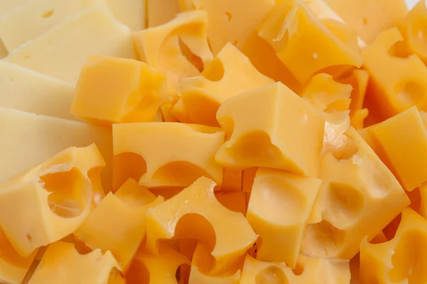 Asortyment różnego rodzaju holland ser, tło — Zdjęcie stockowe