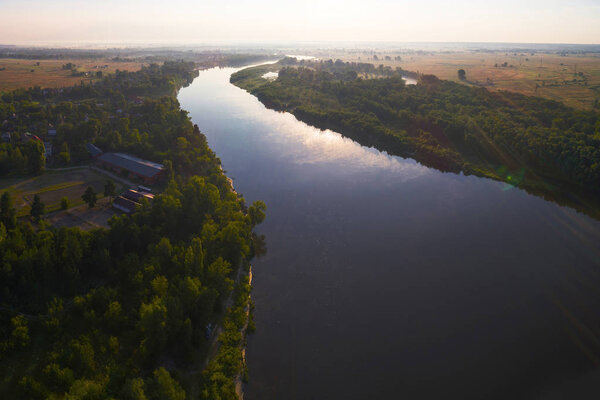 The view of Desna river at sunset time, taken with drone, Ukraine