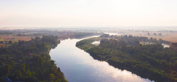 The view of Desna river at sunset time, taken with drone, Ukraine