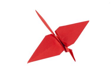 Kırmızı origami vinç beyaz arka plan üzerinde izole