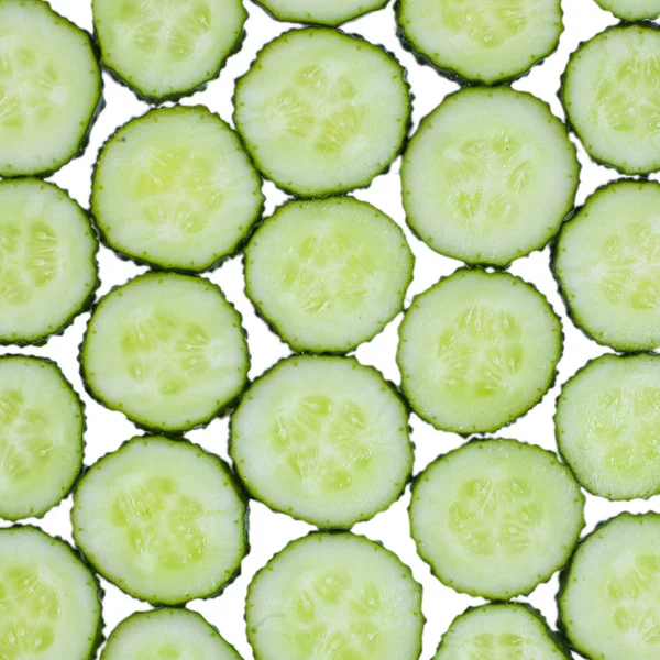 Fresh green slices cucumbers background