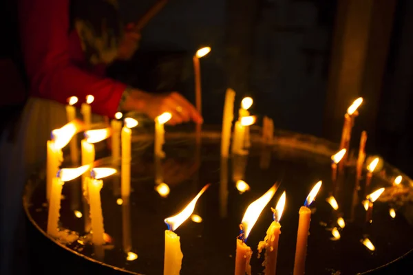 Candles light in the holy sepulchre cathedral in Jerusalem