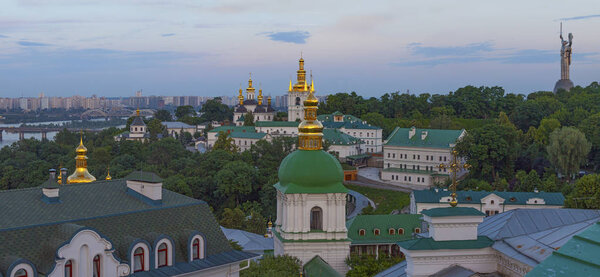 Top view of Kiev with Kievo-Pecherska Lavra and Dnipro river, at the sunset time in May, Ukraine