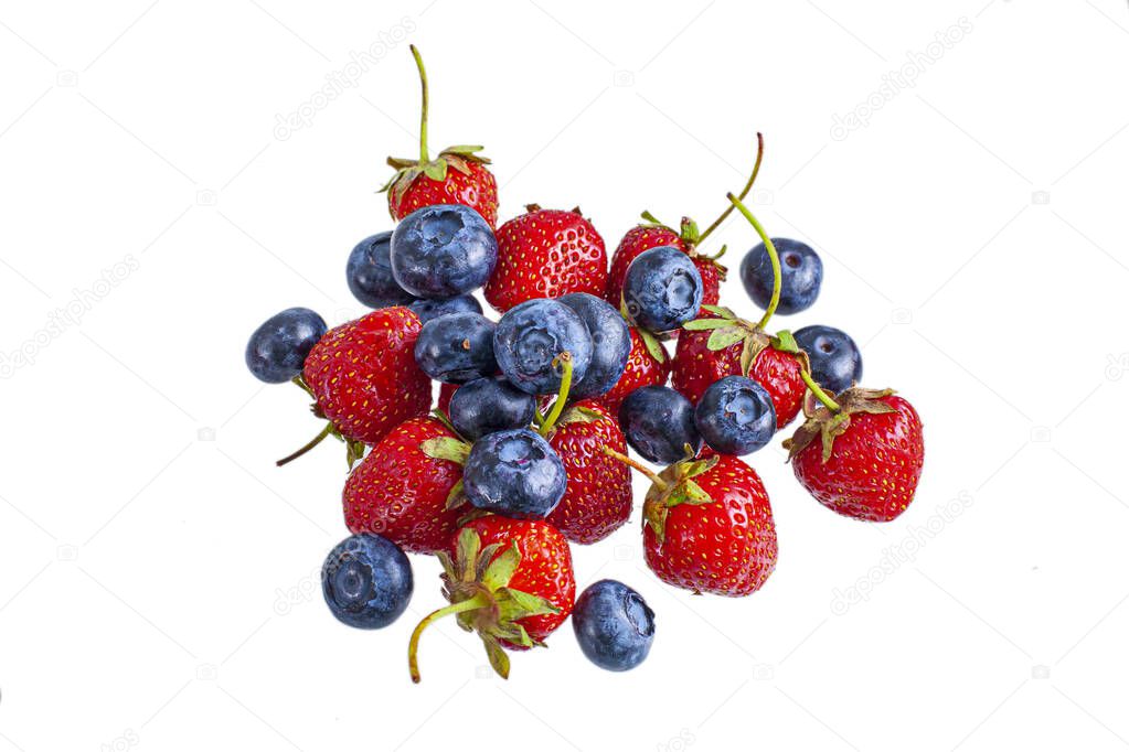 Fresh summer blueberry and strawberry heap, isolated