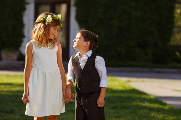 Girl White Dress Holds Boy Hand Fashionable Suit Free Space — Stock Photo, Image