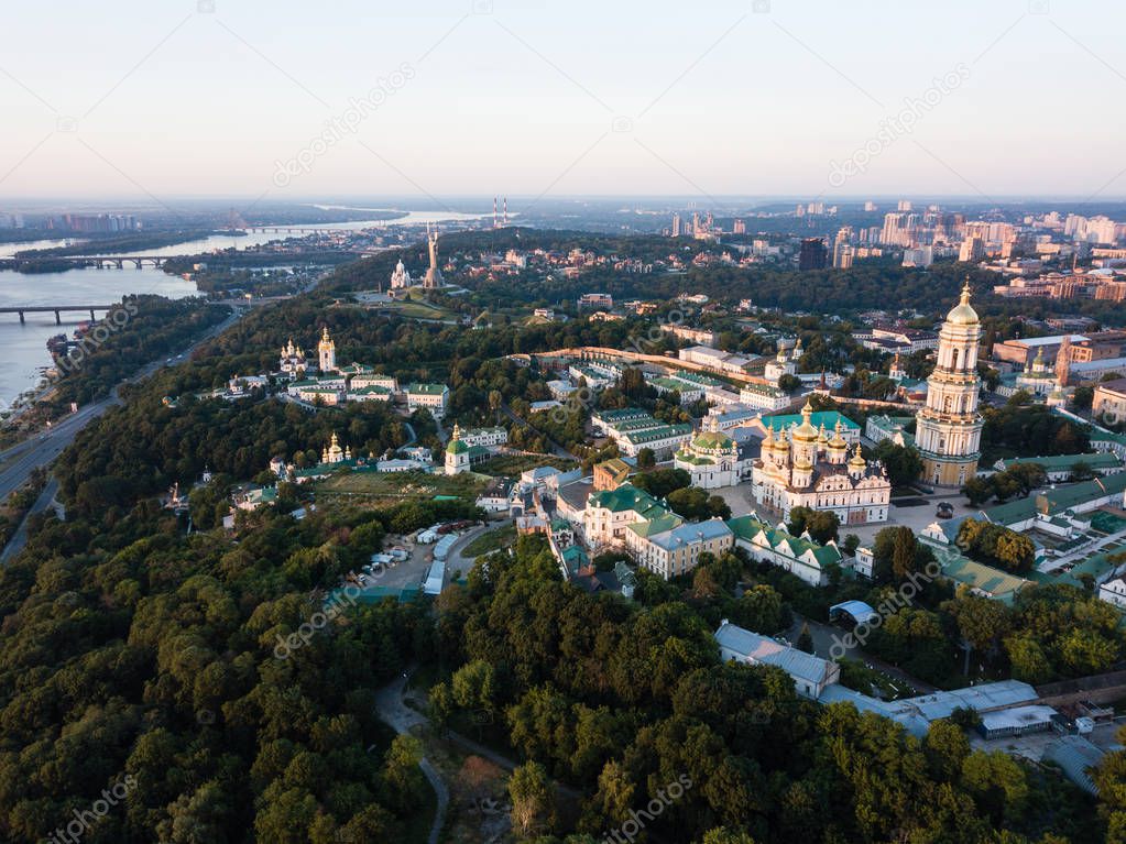 Spectecular aerial panoramic view of Kiev Pechersk Lavra churches and monastery on hills od Dnipro river from above. Famous orthodox sights, Kyiv city, Ukraine