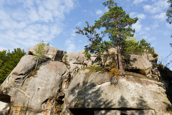 Dovbush Rocks in Bubnyshche. Legendary ancient cave monastery in fantastic boulders amidst beautiful scenic forests in Carpathian Mountains, Ukraine