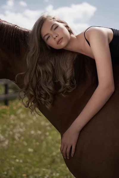Beautiful young lady with horse — Stock Photo, Image