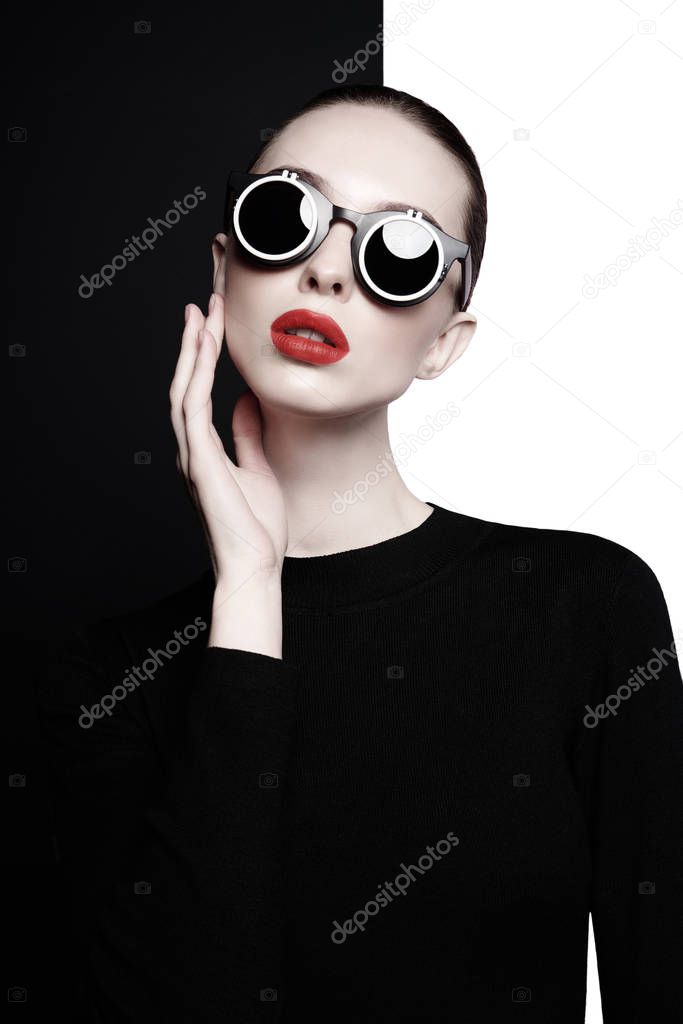 beautiful young woman with black sunglasses