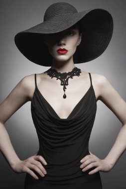 portrait of young lady with black hat and evening dress clipart