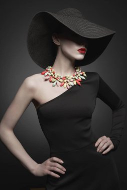 portrait of young lady with black hat and evening dress clipart