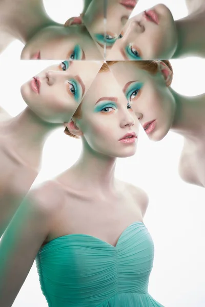 Mladá krásná žena s jasnou barvitou make-up izolované na w — Stock fotografie