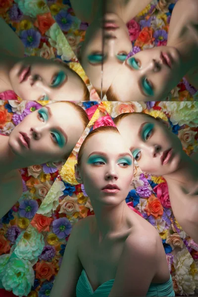 Mujer hermosa joven con maquillaje colorido brillante en flor bac —  Fotos de Stock