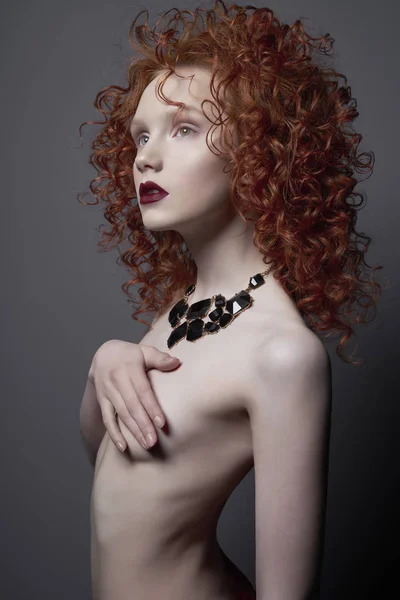 Beautiful nude woman with black jewelry. Fashion portrait — Stock Photo, Image