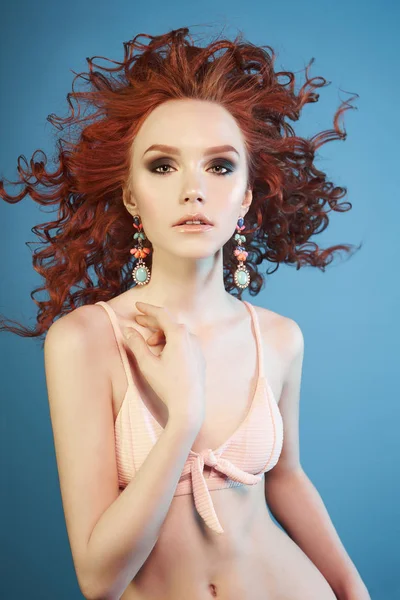 Beautiful sexy woman with red hair and elegant jewelry. — Stock Photo, Image